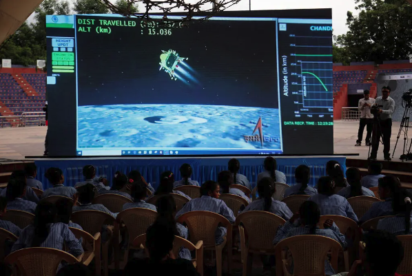 Tuned in to the real-time broadcast from Gujarat Science City in Ahmedabad, India. Photo credit: Amit Dave/Reuters.
